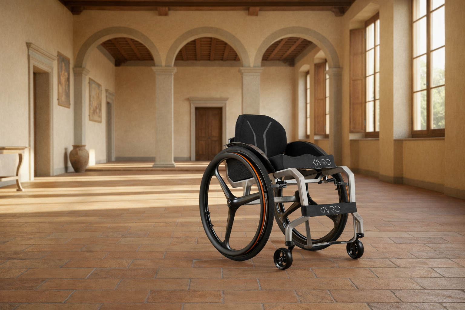 Modern wheelchair in a large, sunlit room with high ceilings and large windows.